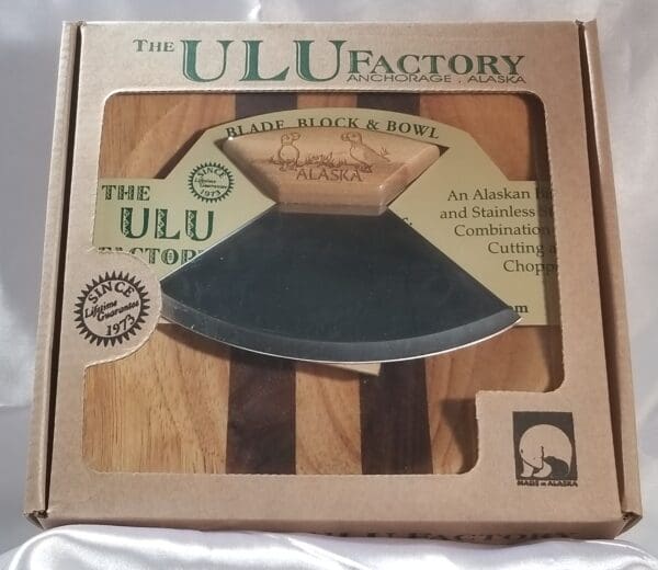 A 6 1/2" Bowl with 5" Ulu & Display Stand in the box.
