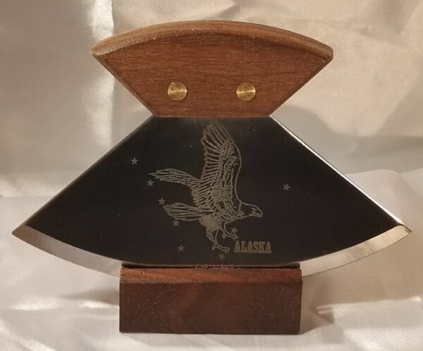 A 6" Alaskana Ulu's - More with an eagle on it.