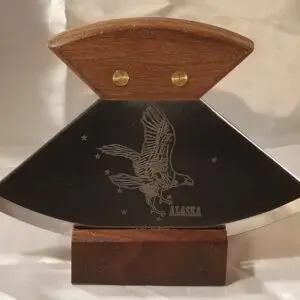 A wooden plaque with a 6" Alaskana Ulu's - More on it.