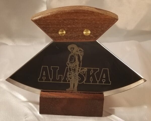 A 6" Alaskana Ulu's - More with the word alaska on it.