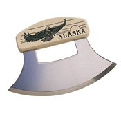 A large ulu knife with an eagle on it.
