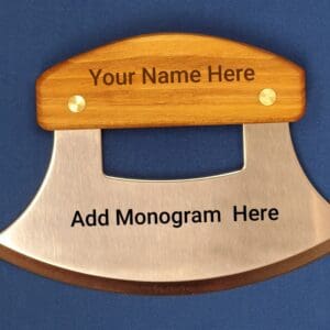 A wooden handle with an engraved name plate.