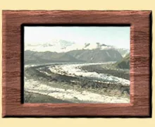 A picture of the mountains in a frame.