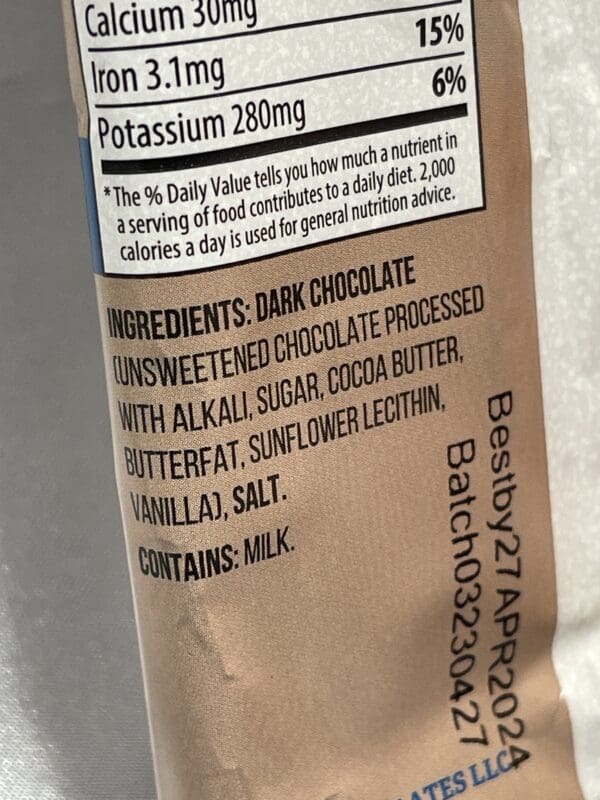 The back of a chocolate bar with ingredients on it.